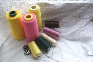 Fototapeta na wymiar silk threads on a white background lace