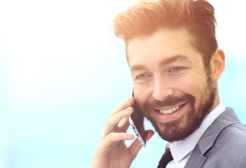 Business man talking on mobile phone