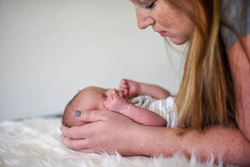 Portrait of mom and newborn
