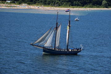 Sailboat in the sea nearby the harbor of Kiel