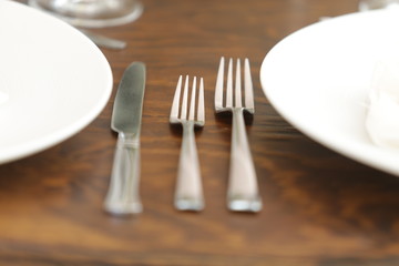 elegant Table decoration with wine glasses, glasses, forks, ornaments, ready to serve in event, wedding, celebration, xv years, baptism