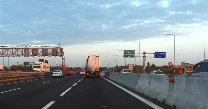 Traffic on Italian highway, road e45, towards napoli, on a sunny autumn evening sunset, in Italy
