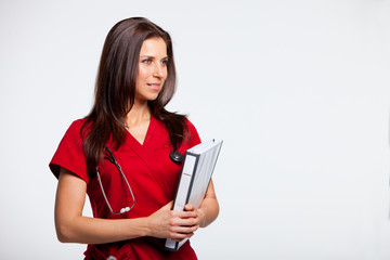Nurse in Red holding a binder