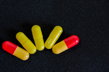 tablets are scattered on the table, dosage for the patient