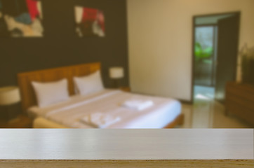 wood top table and Blurred bedroom Vintage