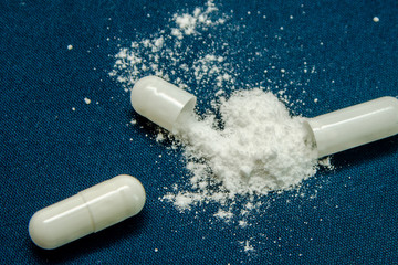 tablets are scattered on the table, dosage for the patient