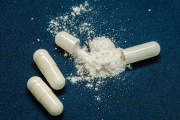 tablets are scattered on the table, dosage for the patient