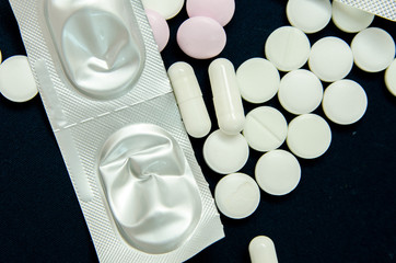 tablets are scattered on the table, dosage for the patient