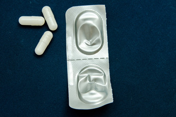 tablets are scattered on the table, dosage for the patient