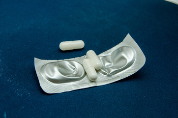 tablets are scattered on the table, dosage for the patient