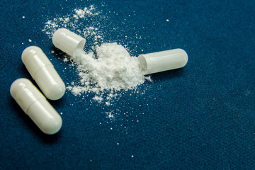 tablets are scattered on the table, dosage for the patient