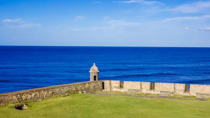 Fototapeta na wymiar Sentry Box and Lawn by the Sea in Old San Juan, Puerto Rico