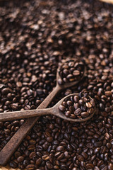 Roasted coffee Arabica coffee quality And a wooden spoon