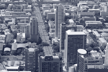 Black and white toned image of skyscrapers of Bangkok city
