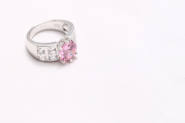 pink gem stone on diamond ring