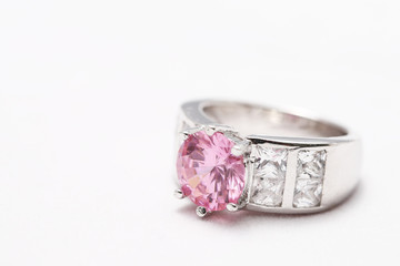 pink gem stone on diamond ring