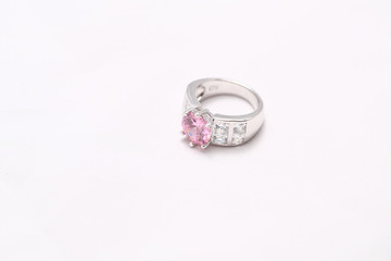 pink gem stone on diamond ring