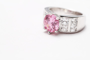 pink gem stone on diamond ring