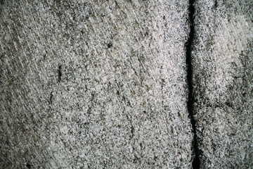 Marble untreated wall with irregularities and cracks