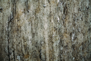 Marble untreated wall with irregularities and cracks
