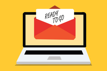 Text sign showing Ready To Go. Conceptual photo Are you prepared for the future travel trip mission start Computer receiving email important message envelope with paper virtual.