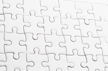 close up white jigsaw puzzle