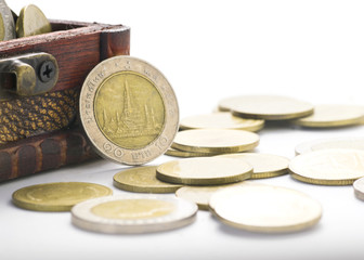 golden coins with treasure chest on white background, money finance saving investment concept with copy space