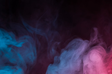 Colorful smoke close-up on a black background