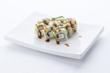 Sushi set and composition at white background. Japanese food restaurant, sushi maki gunkan roll plate or platter set.