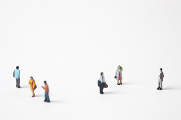 crowd of miniature people in the city