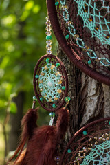 Handmade dream catcher with feathers threads and beads rope hanging