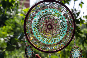 Handmade dream catcher with feathers threads and beads rope hanging