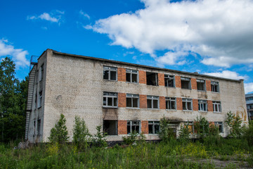 Old, destroyed, abandoned houses and buildings, broken Windows and doors