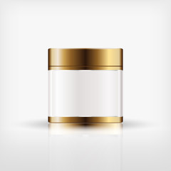 Isolated blank cosmetic bottle with gold cap on white background
