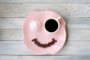 Tasty pink zephyr with honey and flowers on a wooden table. It can be used as a background