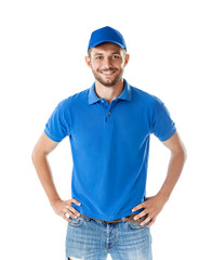 Portrait of confident handsome man in blue uniform isolated