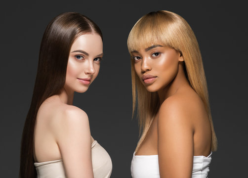 Ethnic beauty skin two women beauty face healthy skin and different colors african and caucasian