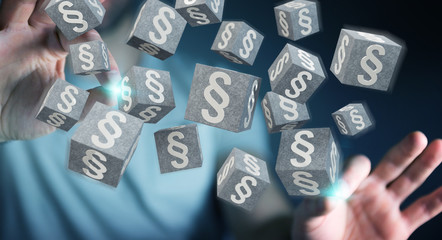 Businessman using 3D rendering law cubes