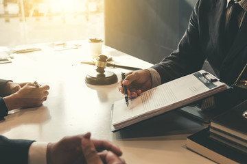 Lawyer give his customers signed a contract in the document. Consulting in regard to the various...