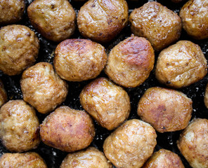 Delicious fried meatballs, top view close up
