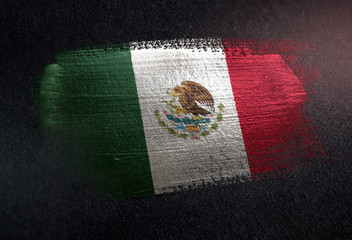 Mexico Flag Made of Metallic Brush Paint on Grunge Dark Wall © natanaelginting
