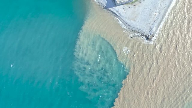 Aerial view of river and sea waters mixing in Rio, Patras city, Greece.