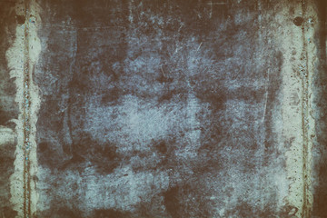 Dark grunge background of old weathered concrete wall texture