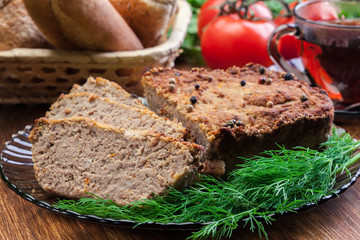 Homemade delicious meat pate with chicken liver on a plate