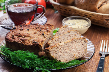 Homemade delicious meat pate with chicken liver on a plate