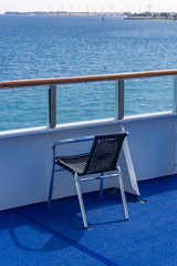 Empty chair on a ferry