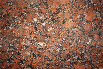 Red granite slab closeup may be used as background zoom in detail