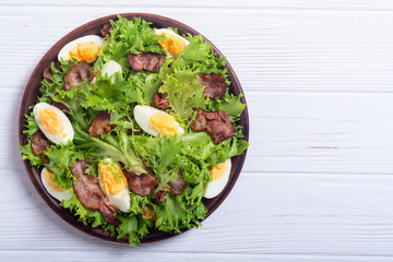 Fresh salad with bacon