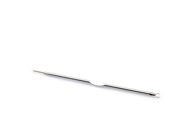 Comedone extractor isolated on white