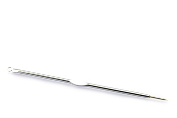 Comedone extractor isolated on white